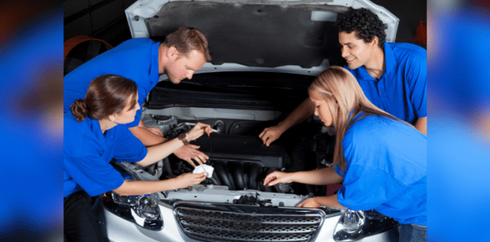 Car maintenance Tips for Teen Cover One adult and four teens stand around a vehicle in blue t-shirts. The adult is teaching car maintenance to teens.